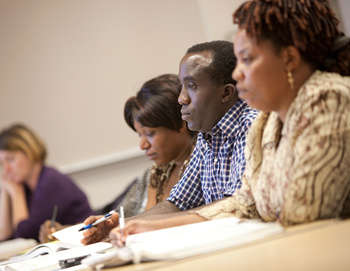 Adult Students Listening to a Business Class Lecture